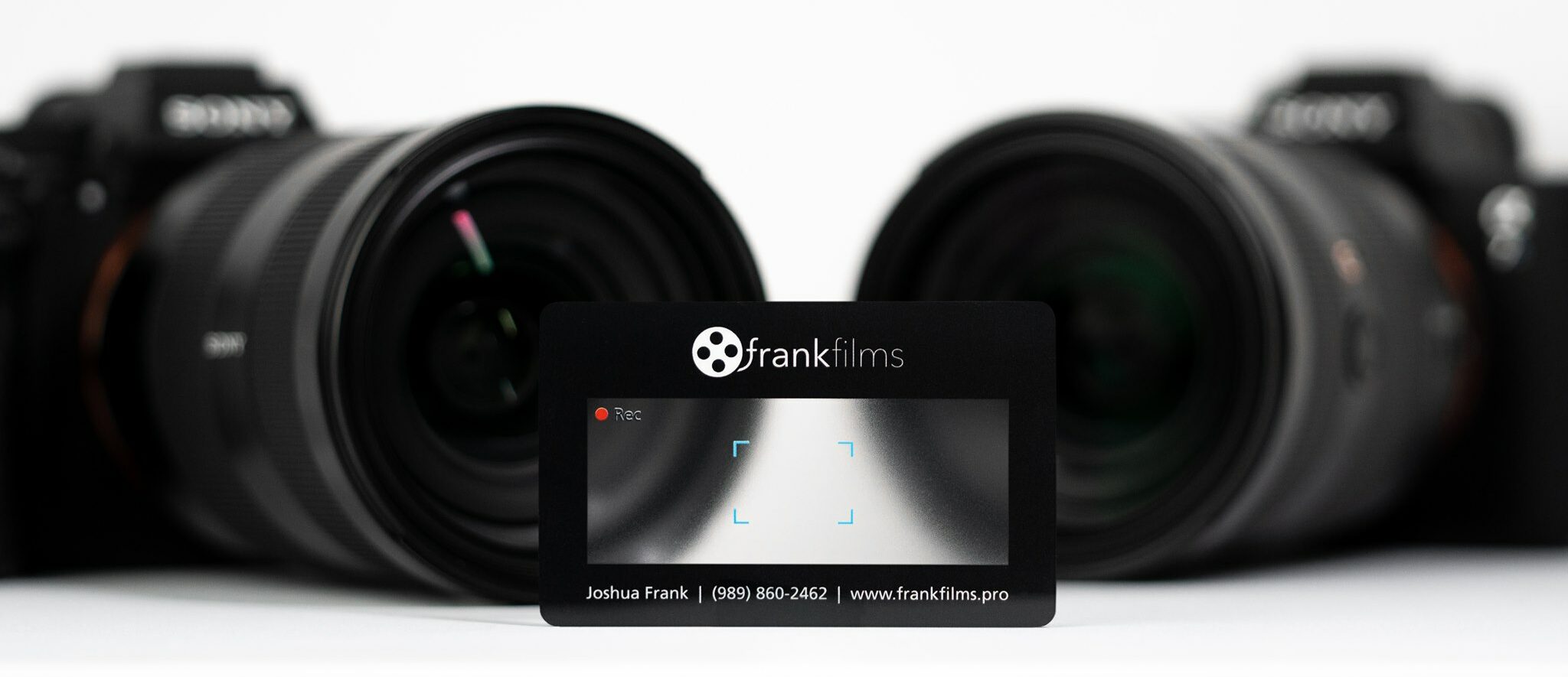 FrankFilms biz card in front of cameras